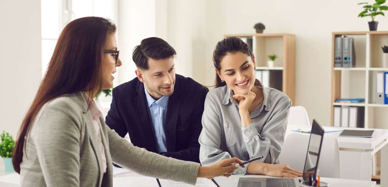 Couple meeting a mortgage broker